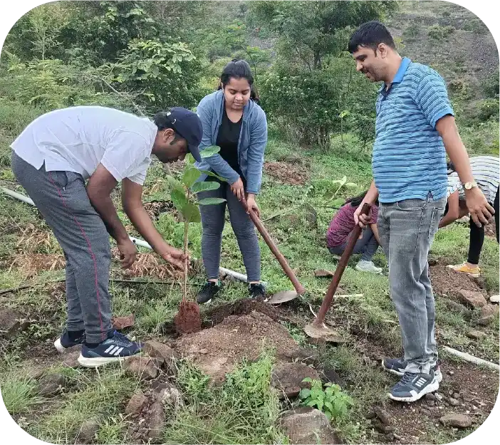 Large group gathered for community tree plantation drive